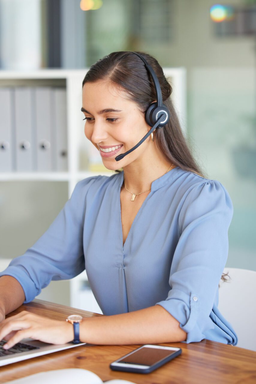 telemarketing-call-center-and-woman-typing-on-laptop-for-technical-support-crm-consulting-and-hel